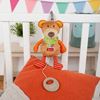 peluche musicale orsetto appeso al lettino per accompagnare il sonno